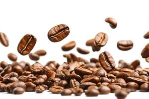 Freshly roasted coffee beans falling gracefully against a plain white background photo
