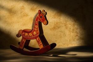 A beautifully crafted wooden rocking horse toy is illuminated by gentle sunlight, casting soft shadows on the warm-toned surface. The scene evokes a sense of nostalgia and childhood joy. photo