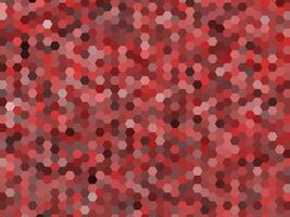 a geometric pattern composed of numerous hexagons in varying shades of red. vector