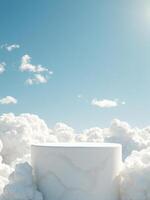 White marble table in the clouds with blue sky photo