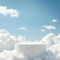 White marble pedestal in the clouds with blue sky background photo