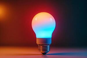 Illuminated lightbulb with red and blue glow on dark background. photo