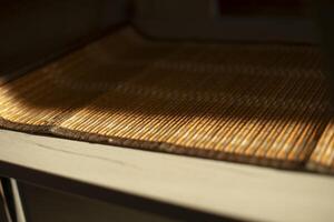 Light on an empty shelf in a room. Daylight in a dark room. photo