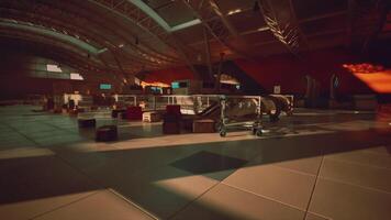Exploring the remnants of an abandoned airport terminal bathed in sunset light video