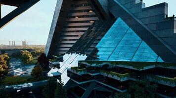 Modern architectural structure with glass and greenery in urban setting video