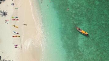 Aerial View Of People Relaxing On Tropical Beach On Phi Phi Island, Thailand. video