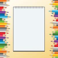 Blank Drawing Book with group of color pencils vector