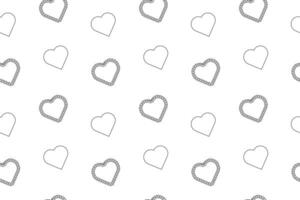Seamless black and white pattern with outlined hearts and lace-inspired designs, ideal for coloring projects. vector