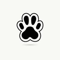 A black and white paw print icon on a white background vector