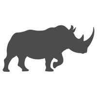 A powerful rhinoceros silhouette, highlighting its iconic horn and sturdy build, symbolizing strength, resilience, and untamed nature. vector