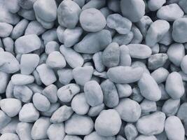 Smooth White Pebbles or white rock Texture photo