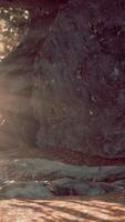 Empty road goes through the cave with glowing end video