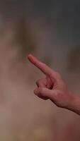 Abstract hand gesture characterized by its presence against a beautifully soft background video