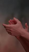 Elegant and Expressive Hands Clapping Together with a Soft and Artistic Background video
