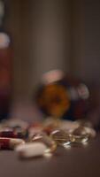 A Colorful Array of Various Types of Pills and Dietary Supplements Displayed on a Table Surface video