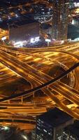 A stunning nighttime aerial view showcasing the intricate network of urban highway interchanges video