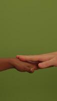 An Outstretched Hand Set Against a Beautiful Green Background Representing Connection and Unity video