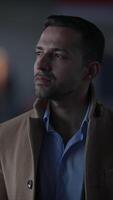 A Thoughtful Man Dressed in Stylish Attire, exuding both confidence and charisma video