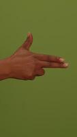 Hand Gestures Displayed on a Green Background, Creating an Engaging Visual Composition video