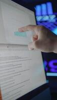Conducting a Thorough Analysis of Data Trends Displayed on a Digital Screen Environment video