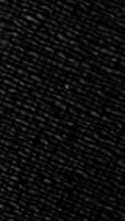A CloseUp Shot Featuring Textured Black Fabric, Perfect for Stock Use in Various Projects video