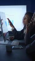 The Business Team is Actively Analyzing Data on a Computer Display for Insights and Strategies video