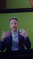 A Professional Presenter operating on a Green Screen Background for dynamic engagements video