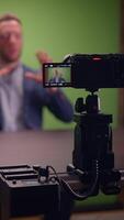 A Comprehensive Professional Filming Setup Complete with a Green Screen Background for Various Uses video