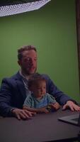 An Interactive and Engaging Moment Shared Between an Adult and a Child in a Studio Setting video