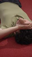 Take a moment to reflect while sitting quietly on the floor, embracing tranquility and peace video