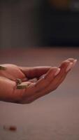 A closeup view of a hand holding a small object, showcasing intricate details and beauty video