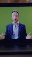 A skilled presenter using a green screen to enhance presentations and engage the audience video