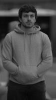 A Contemplative Man in a Gray Hoodie A Profound Moment of Reflection and Introspection video