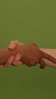 An Elegant Hand Gesture Set Against a Bright Green Background Making a Visual Statement video