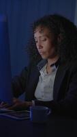 Focused Professional Working Late on Computer in a Modern Office Environment at Night video