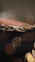 Intimate CloseUp of Various Coins Arranged Neatly on a Dark Textured Surface Area video