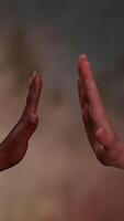 An Artistic Representation of Hand Gestures Set Against a Beautiful Background Design video