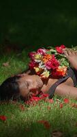 A Graceful Pose Surrounded by Beautiful and Colorful Flowers within a Lush Natural Setting video
