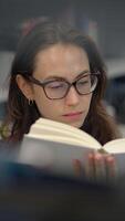 A Highly Focused Reader Who Enthusiastically Explores the Many Depths Found Within a Book video