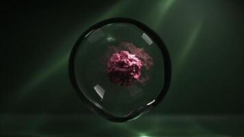A pink cell structure with a rough surface, featuring thin, flexible, tentacle-like appendages resembling a virus, floating inside a transparent spherical bubble against a green background video