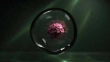 A pink cell structure with a rough surface, featuring thin, flexible, tentacle-like appendages resembling a virus, floating inside a transparent spherical bubble against a green background video