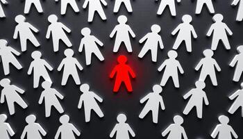 A glowing red figure standing surrounded by white figures, symbolizing leadership and creative idea, Different thinking, Individuality concept photo