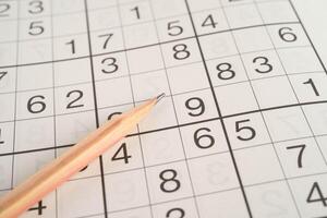 Sudoku puzzle, game to play for keep you brain younger for developing Alzheimer disease in senior patient. photo