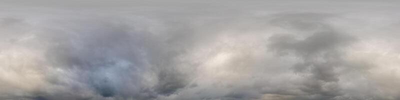 Sky panorama on overcast rainy day with low clouds in seamless spherical equirectangular format. Complete zenith for use in 3D graphics, game and for aerial drone 360 degree panorama as a sky dome photo