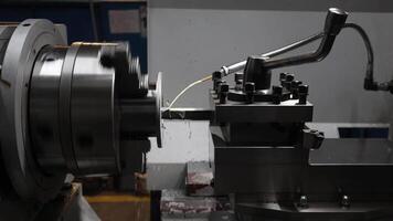 Working lathe with liquid coolant, close up video