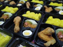 Golden Turmeric Rice Bento Boxes.A Vibrant and Flavorful Culinary Delight photo