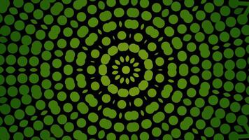 shiny green kaleidoscope circles creating a contrasting on black background. video
