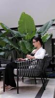 Attractive european woman using computer, analyzing stock exchange market crypto trading. Female System Administrator Working with Data Protection Network for Cyber Security. Vertical shot video