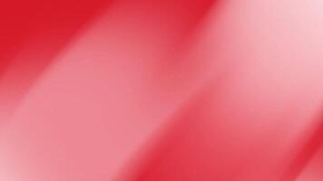 Red gradient background features subtle light streaks and specks. video