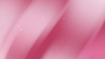 Pink gradient background features subtle light specks. video